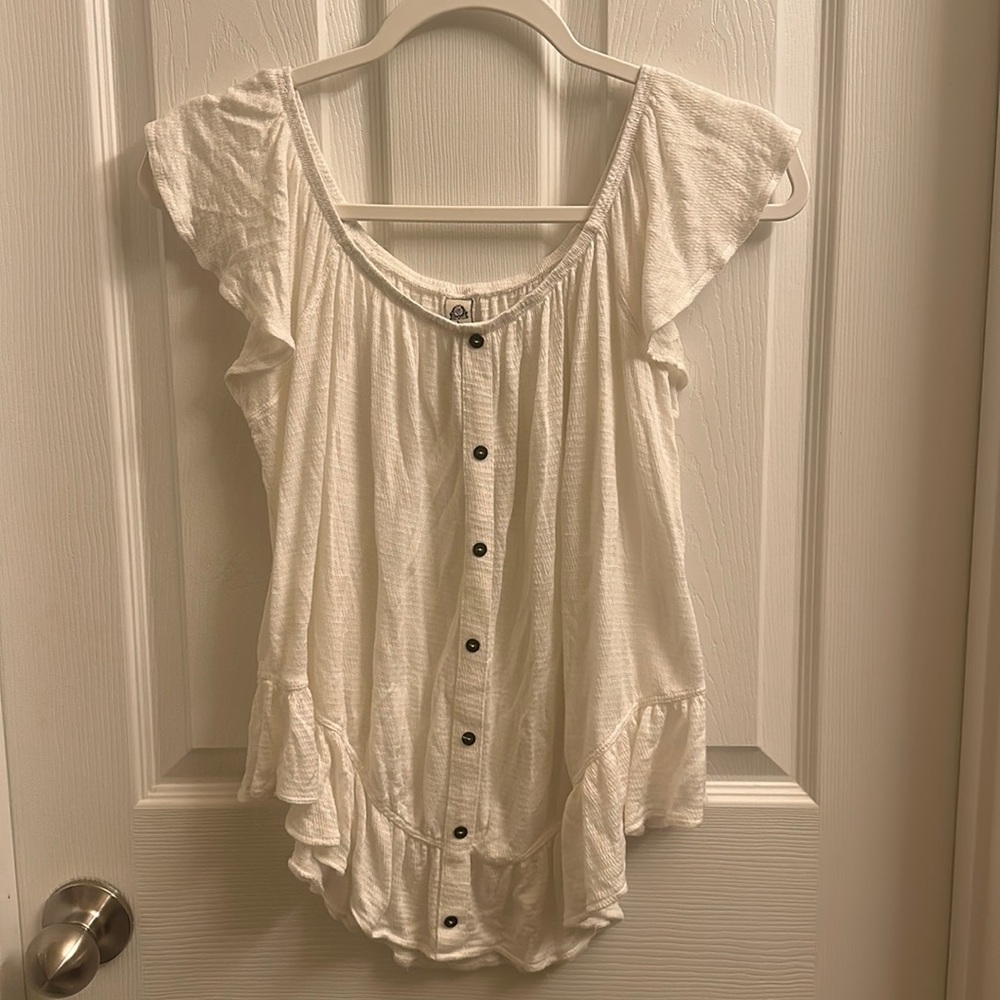 White ruffled top
